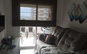 Apto com sacada gourmet e vista para o mar